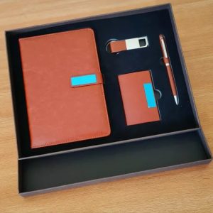 Brown 4-in-1 executive corporate gift set A5 notebook, ballpoint pen, a cardholder, and a keychain
