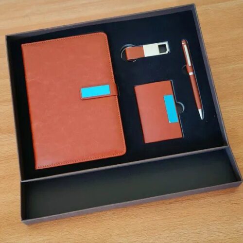Brown 4-in-1 executive corporate gift set A5 notebook, ballpoint pen, a cardholder, and a keychain