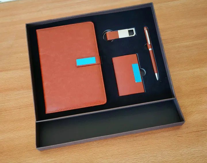 Brown 4-in-1 executive corporate gift set A5 notebook, ballpoint pen, a cardholder, and a keychain